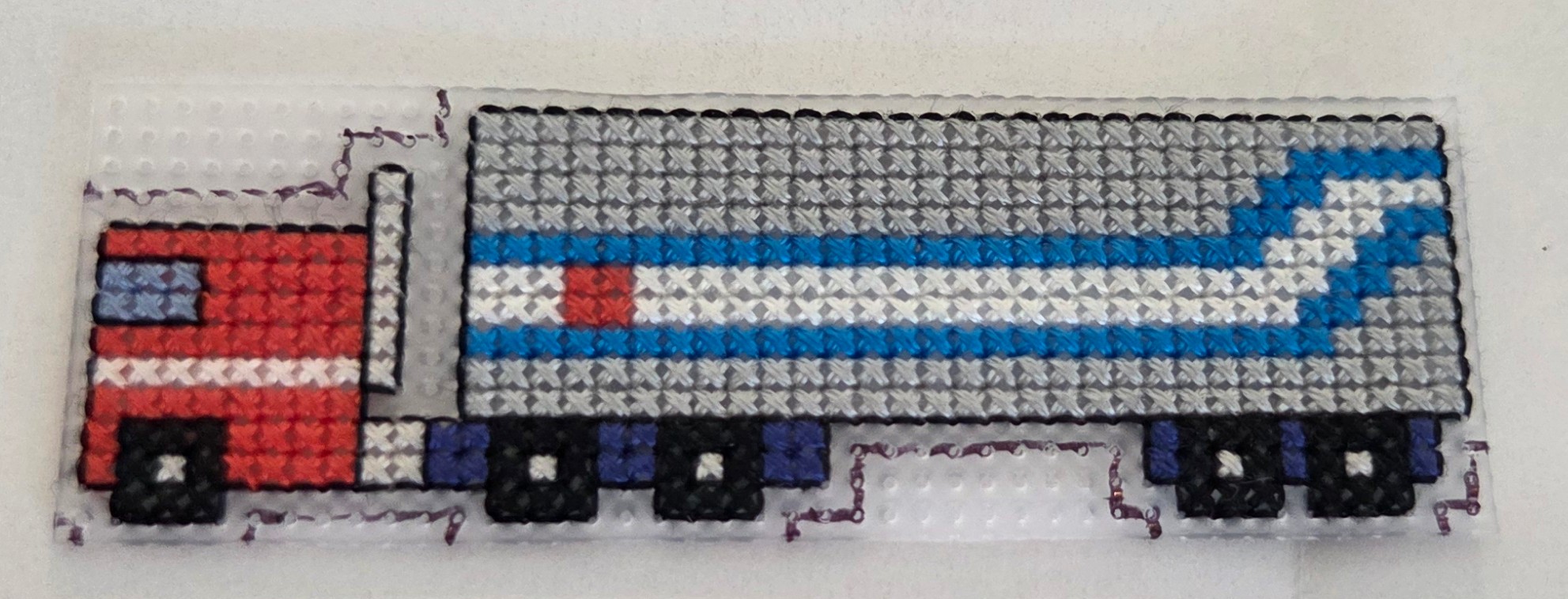 Same piece, unfinished, but with backstitching.