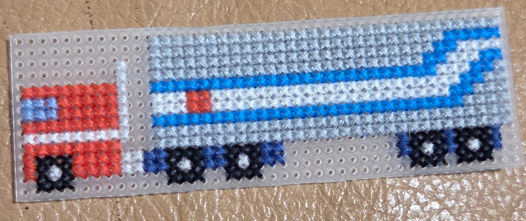 Unfinished piece without backstitching.